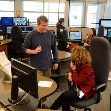 911 emergency dispatchers in dispatch center. 