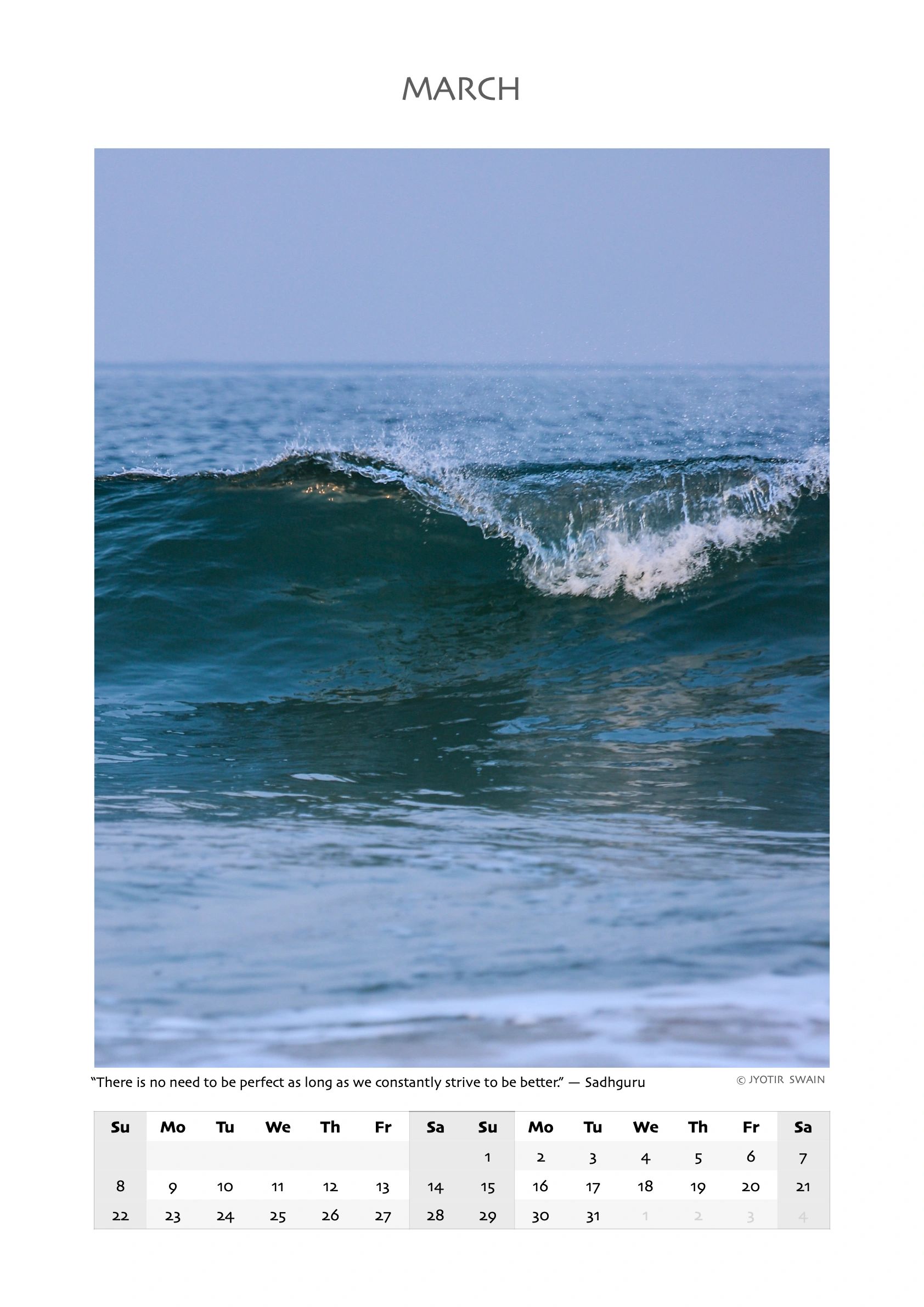 A serene ocean wave captured in March calendar photo.