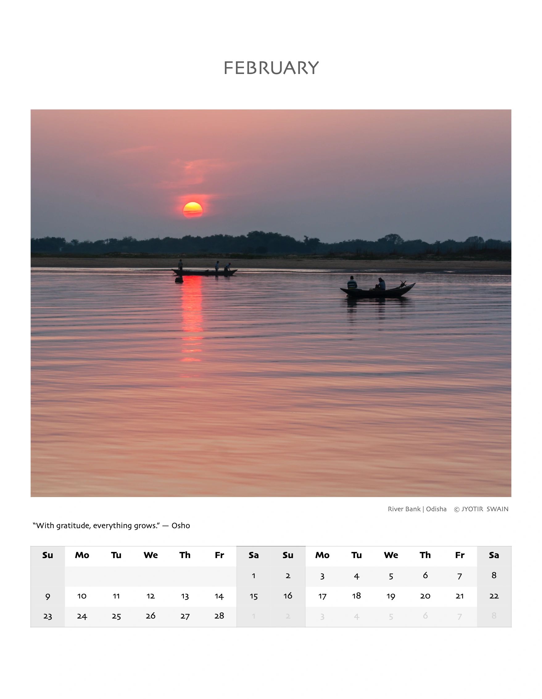 Sunset over a river with boats and calm water at Odisha's river bank.