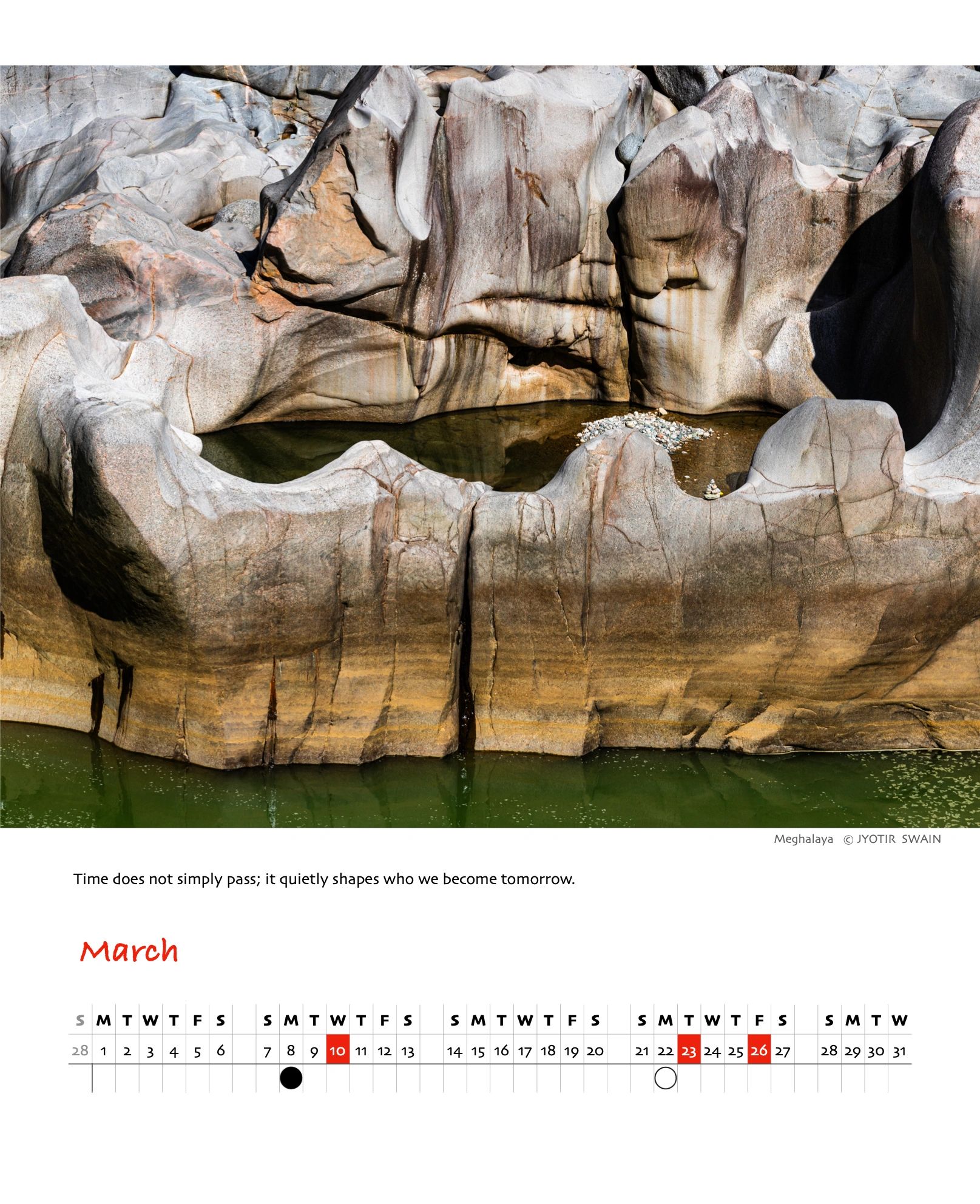 Rock formation with water pool in Meghalaya.