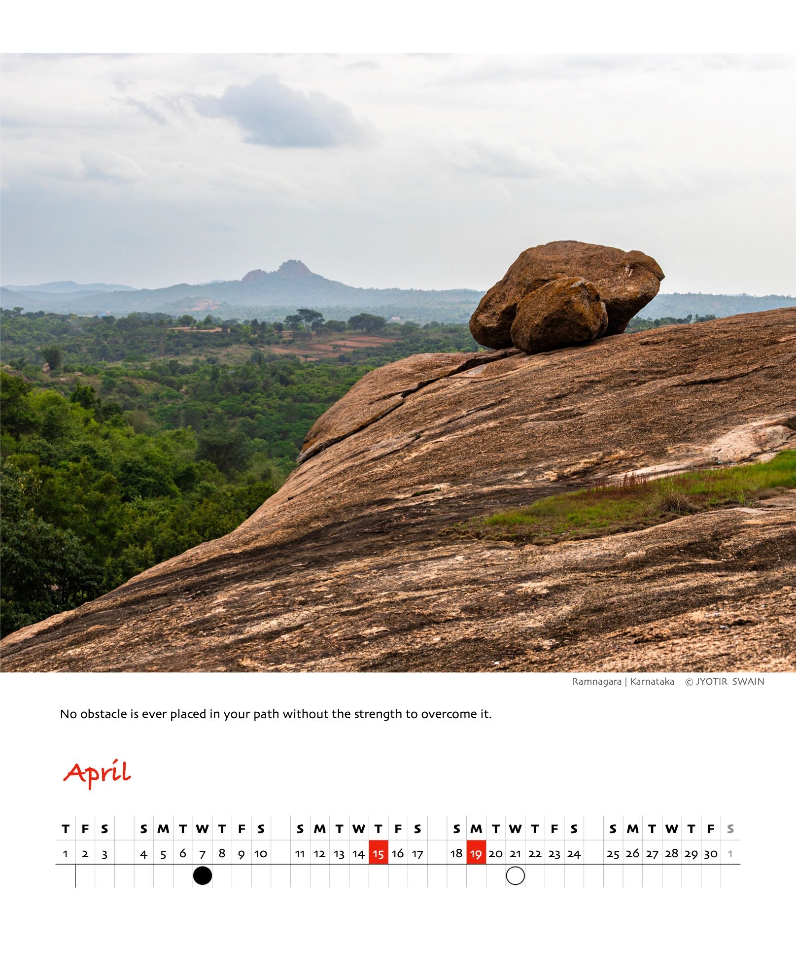 Rocky landscape in Ramnagaram, Karnataka with a motivational quote.