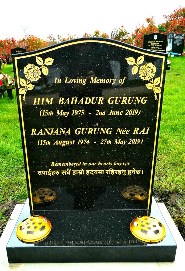 Headstone memorial for Him Bahadur Gurung and Ranjana Gurung.