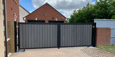 Composite driveway gates, composite gates made to order, bespoke domestic driveway gates.
