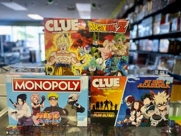 Board games including: Dragon Ball Z CLUE, Naruto Monopoly, and My Hero Academia CLUE 