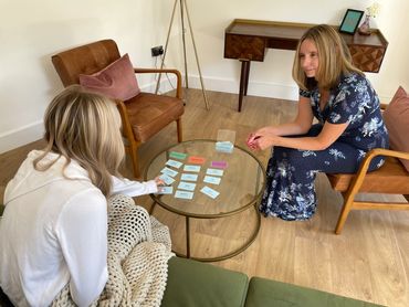 Bethan Whitelaw Counsellor looking at Values cards with a teenage counselling client