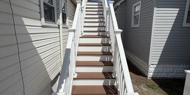 Outdoor staircase between two houses.