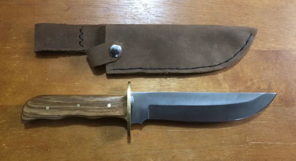 Stainless steel camp knife with Zebra Wood handles and hand crafted leather sheath