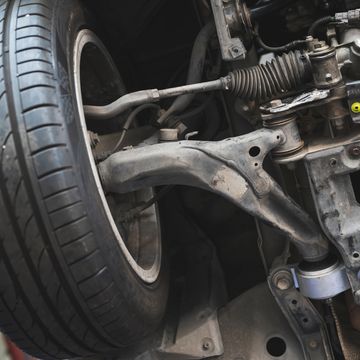 Car steering, suspension, and alignment repair being completed at Autotexs collision and auto repair