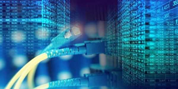 Fiber optic cables transmitting data with digital code overlay.