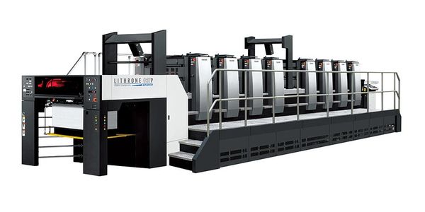 A large industrial Lithrone offset printing machine with multiple units and safety railings.