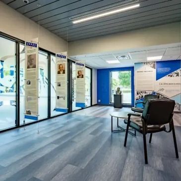 Modern waiting area with informational displays and seating.