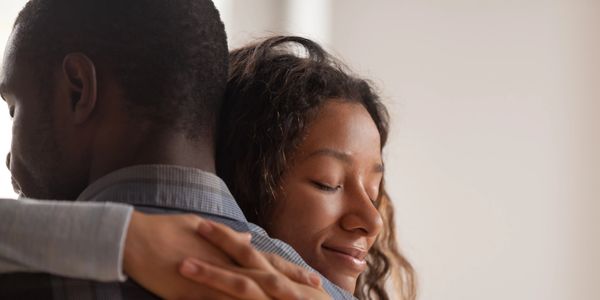 Woman hugging her partner