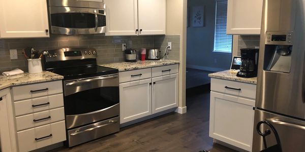 Engineered hardwood flooring throughout main level.