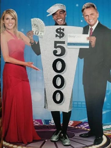 WHEEL OF FORTUNE SPOKESPERSON
BARRY BRISCO WITH VANNA WHITE AND PAT SAJAK.
5K EVERYDAY PROMOTION