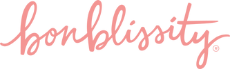 Pink cursive text reading 'bomblicity'.