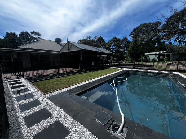 Pool works, some turf, paving, and steppers