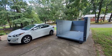 20 yard dumpster with rear door open.