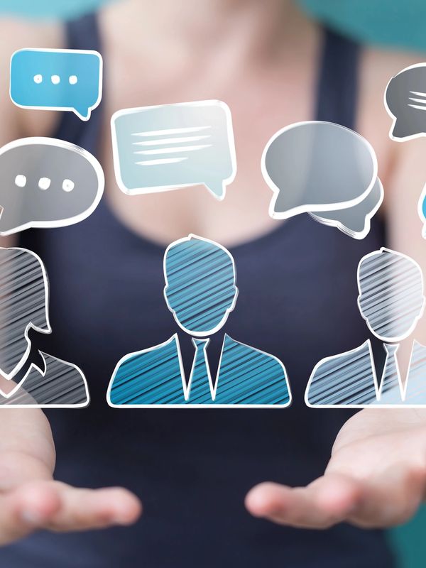 lady holding speech bubbles