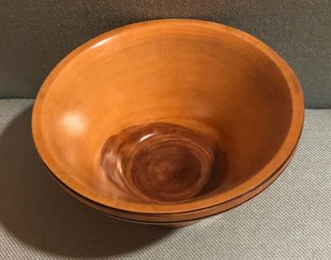 A shiny wooden bowl