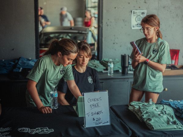 Family at auto service center, automotive repair, grand opening, Roswell, Georgia