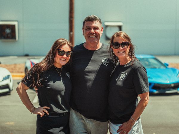 Family at auto service center grand opening, auto shop grand opening, Roswell, Georgia