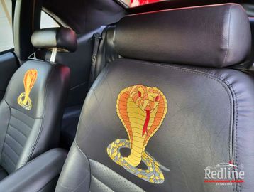 Ford Mustand Cobra interior/exterior seasonal package. Custom seats designed for the 