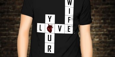 A person wearing a black shirt with text love your wife