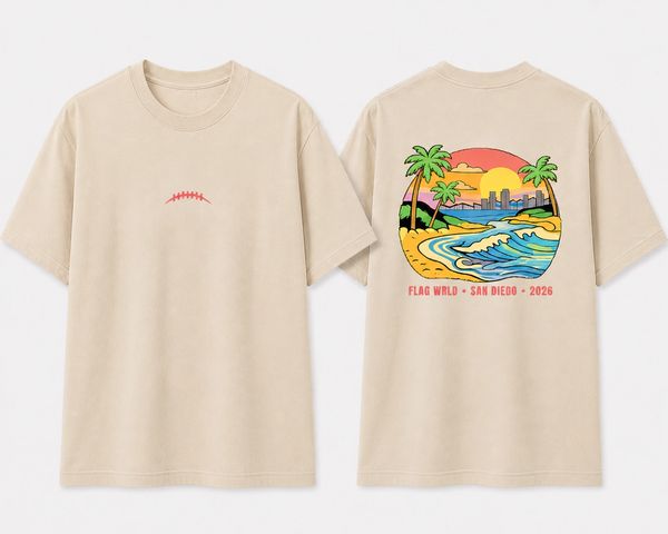 Beige t-shirt with a small red stitch design on front and colorful beach scene on back.
