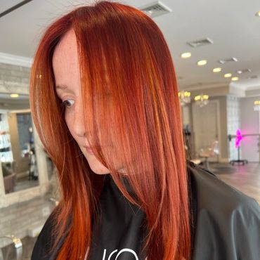 Woman with bright red hair.