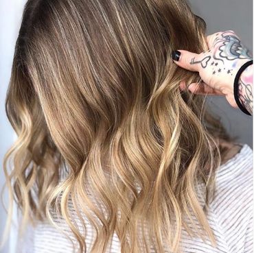 Woman with blonde highlights.
