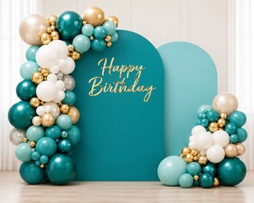 Elegant teal and gold balloon arrangement with a Happy Birthday sign.