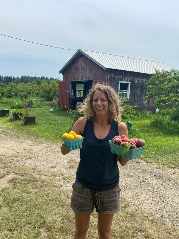 Annie picking fruit