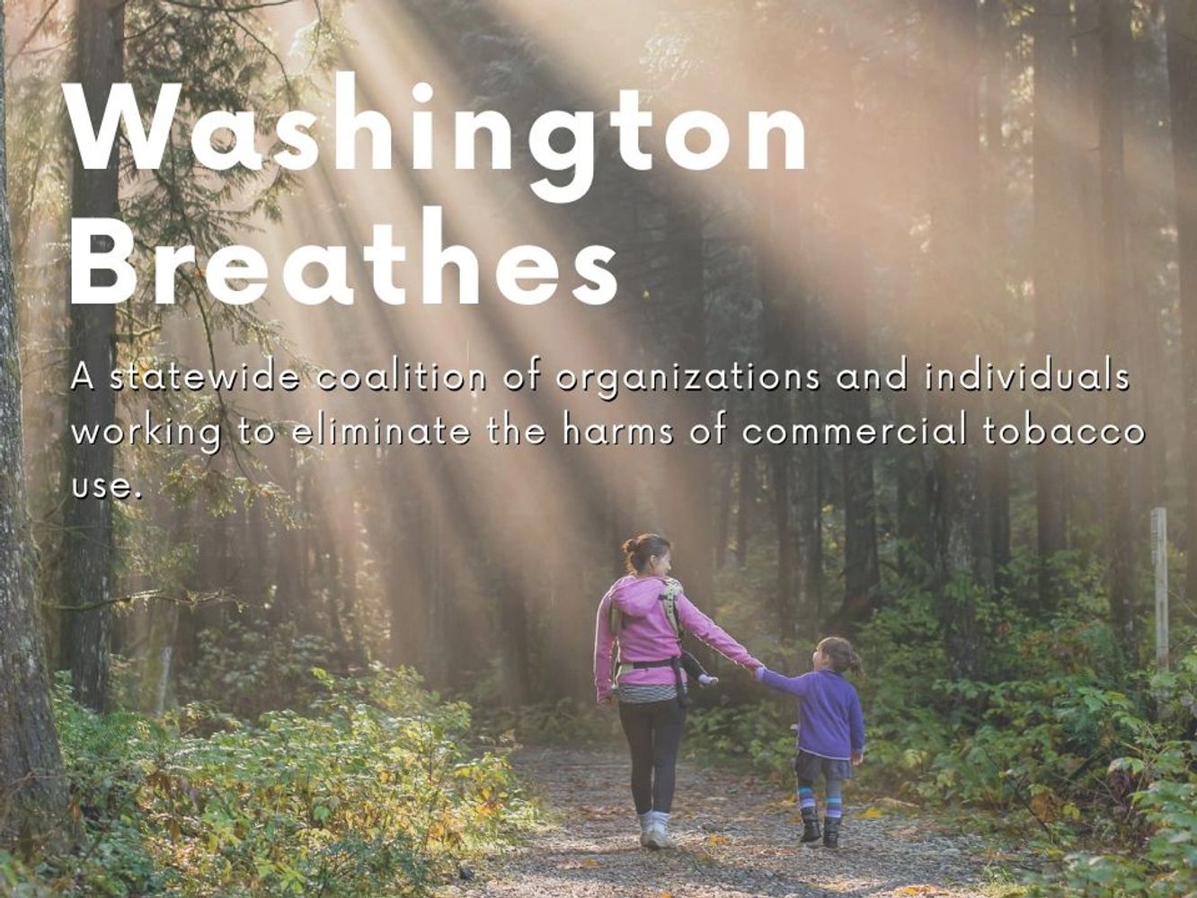 Washington Breathes text over image of parent and child walking down forest path. 