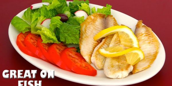 Lettuce and fish along with lemon