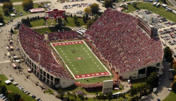 Aerial view of a packed football stadium.