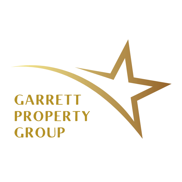 Garrett Property Group logo featuring a gold star and gold text on a white background