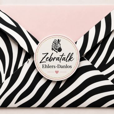 Envelope sealed with a zebra-striped sticker labeled Zebratalk Ehlers-Danlos.