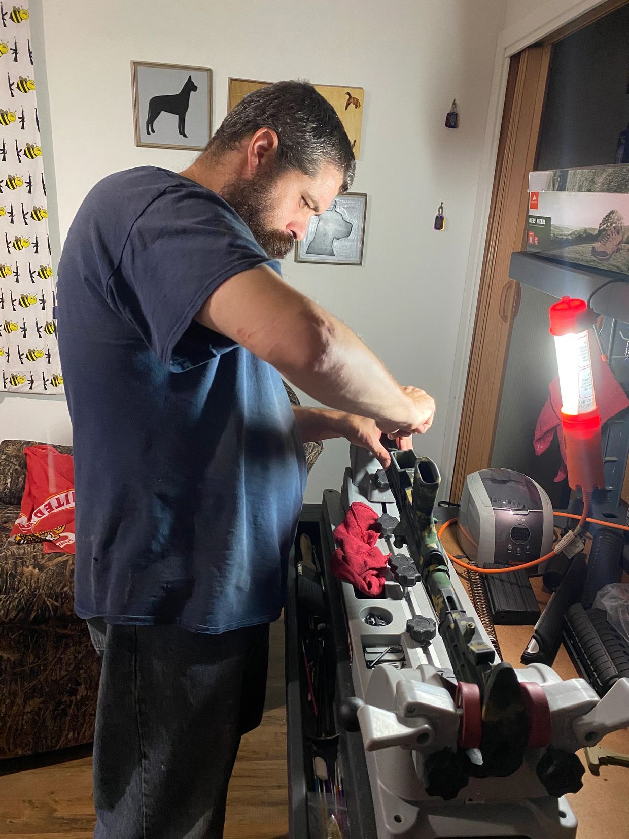 The gunsmith hard at work repairing and building firearms. 