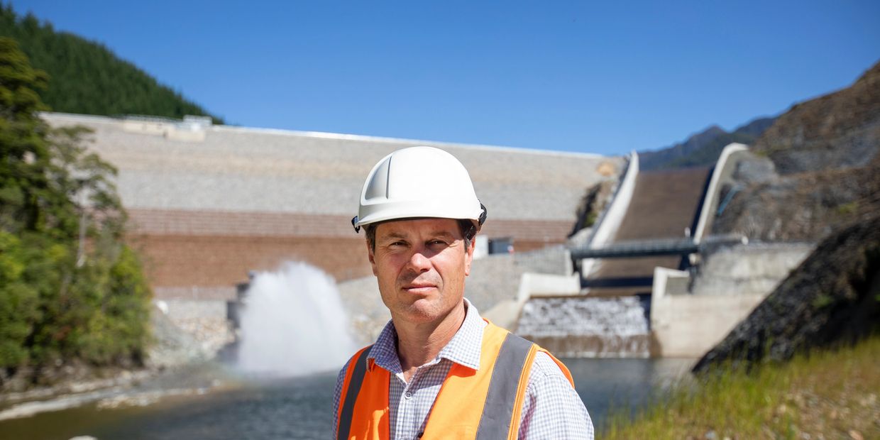 Mike Scott in front of dam spillway.