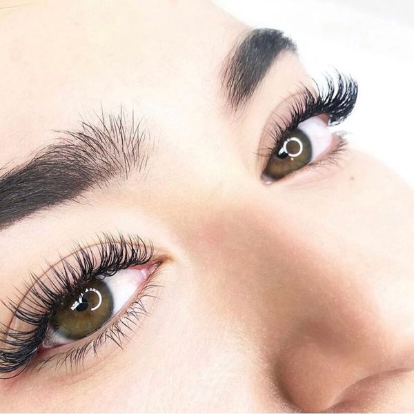 Close-up of eyes with long, curled eyelashes.