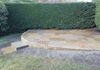 After landscaping, using sleepers and indian sandstone paving
