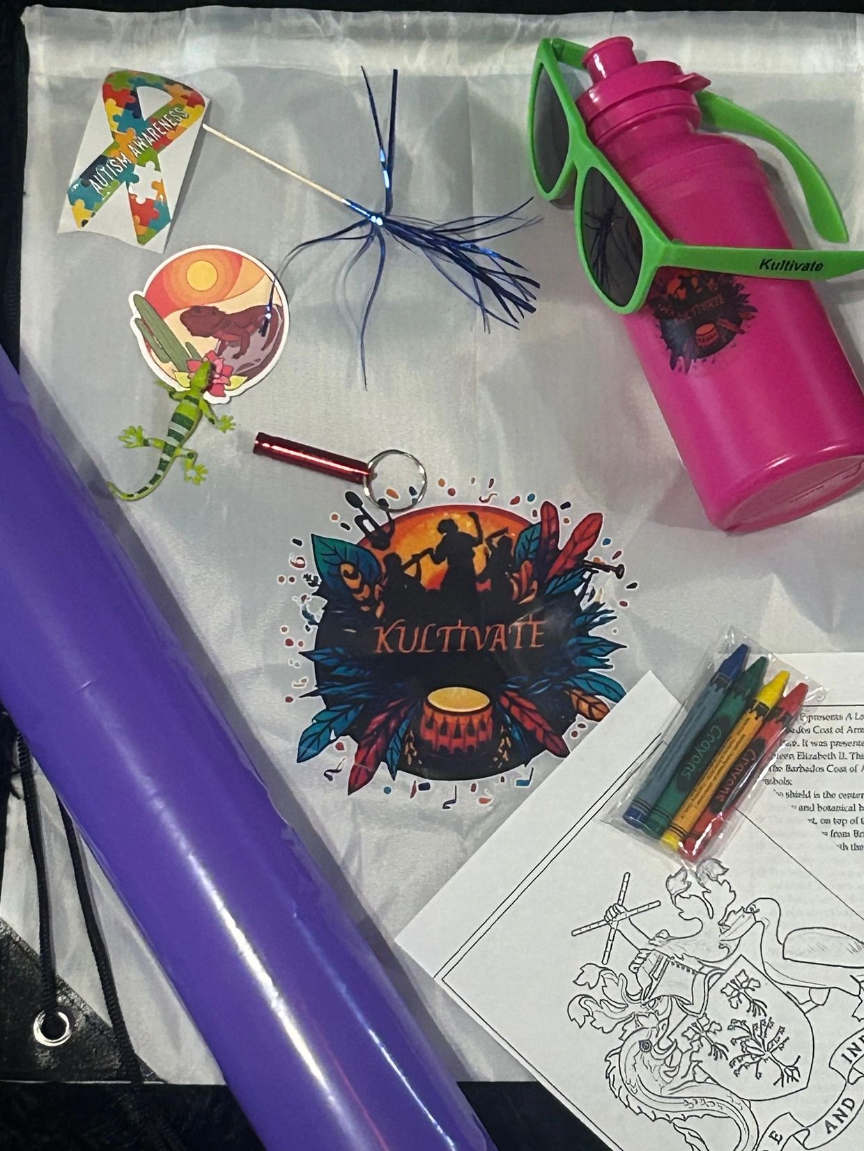 Kultivate-themed items including a water bottle, sunglasses, crayons, and stickers.
