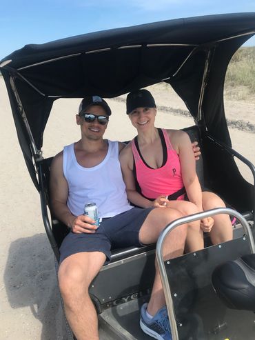 A couple giving pose for picture