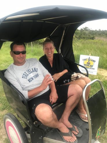 A couple sitting in a vehicle