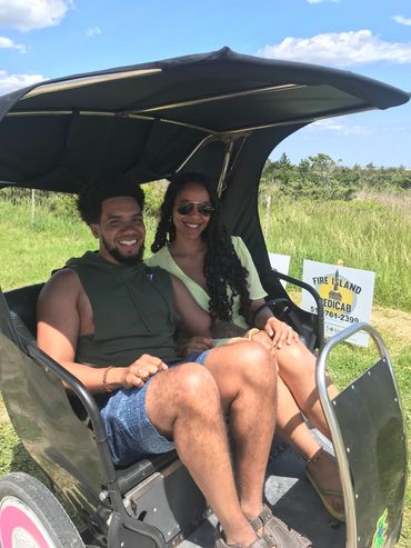 A couple giving pose for picture