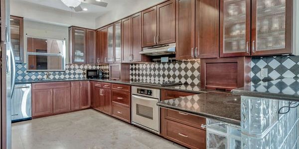 Palatial 4-5 bedroom/3.5 bath condominium with golf course view, close to shopping, and downtown Wes