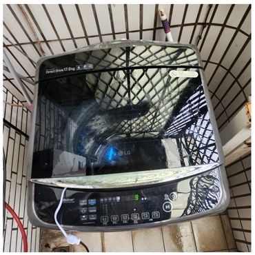 Top-view of an LG washing machine with digital controls.