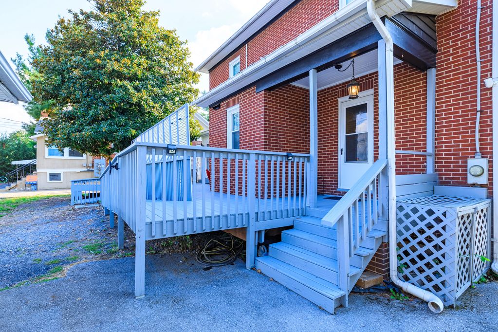 Convenient parking in the back with a ramp for easy wheeled access to the kitchen door
