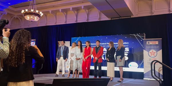 Group posing on stage at the 2026 Osceola Stars Awards finalist recognition event.