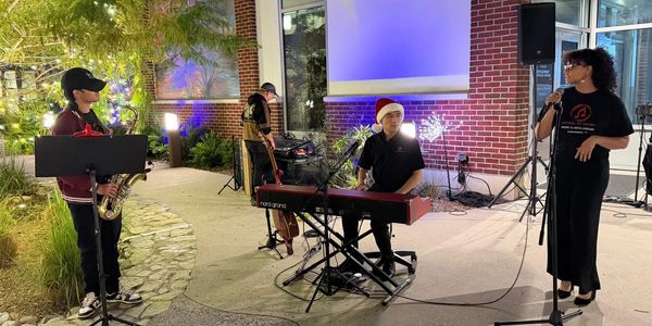 School of Talent instructors perform at Kissimmee's City Hall. 